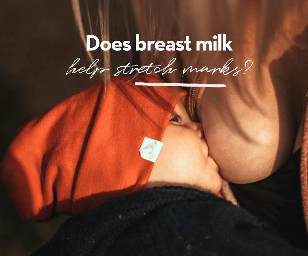 A close-up of a baby breastfeeding, wearing a red beanie. The focus is on the baby's face and the mother's breast, symbolizing the nurturing bond. The text overlay reads: 'Does breast milk help stretch marks?'